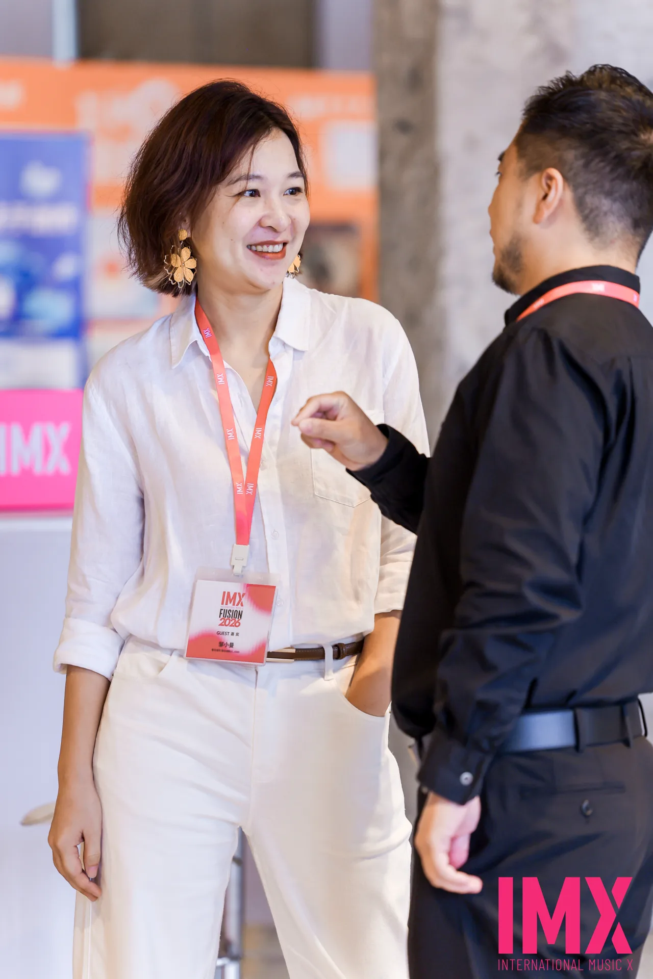Xiaoman Zou, Co-Founder and COO of Kanjian Music, engaging with industry leaders in the networking lounge